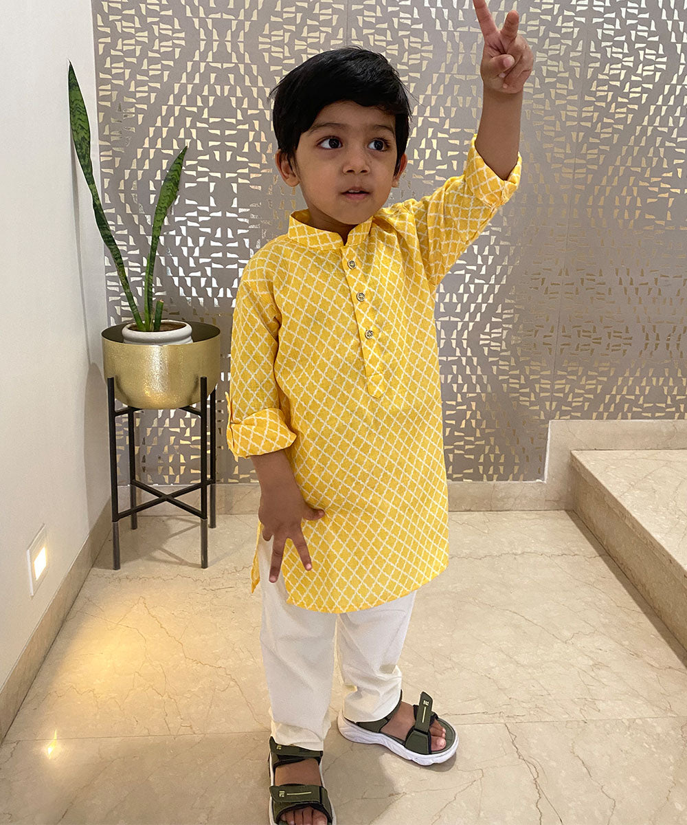 It is a self-checked smart kurta for a kid boy that comes with a matching pyjama.