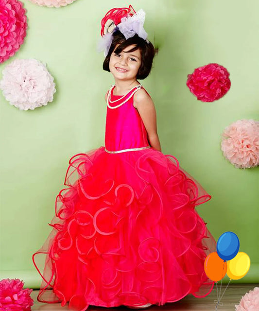  It’s a pink and red Colored party gown that comes with a back zip closure. It features lace and pearl detailing. Moreover, it also has a fabric belt to be tied at the back.