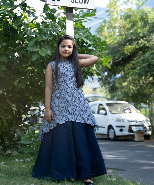  It’s a navy blue Colored gown that comes with a back zip closure. Moreover, it comes with matching sleeves that can be attached as per your requirements. It features an embellished neck and a fabric belt to be tied at the back. 