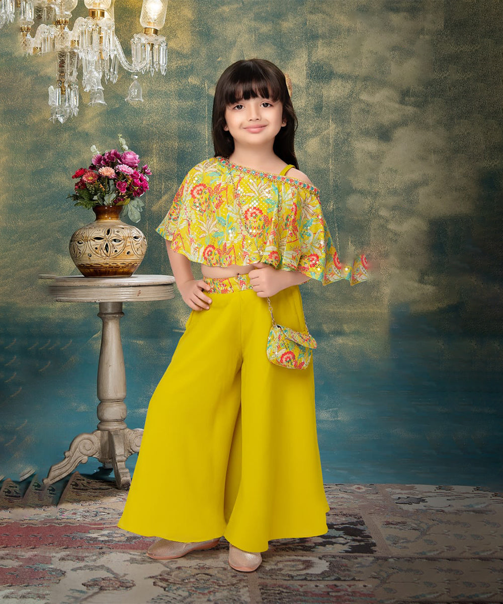 Yellow coloured printed Kids Girls Sharara Set in Rich Fabrics for Parties and Festivities